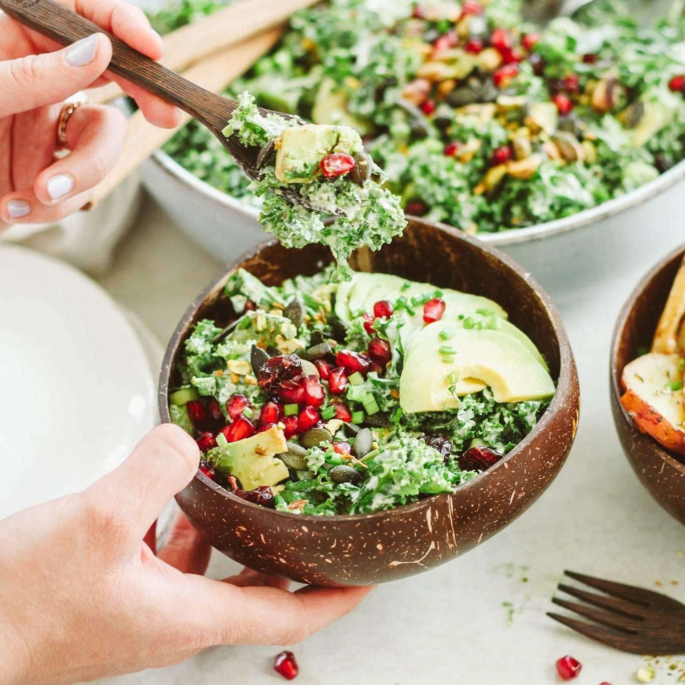 Creamy Kale, Pomegranate and Avocado Salad w/ Garlic Sunflower Cream Dressing